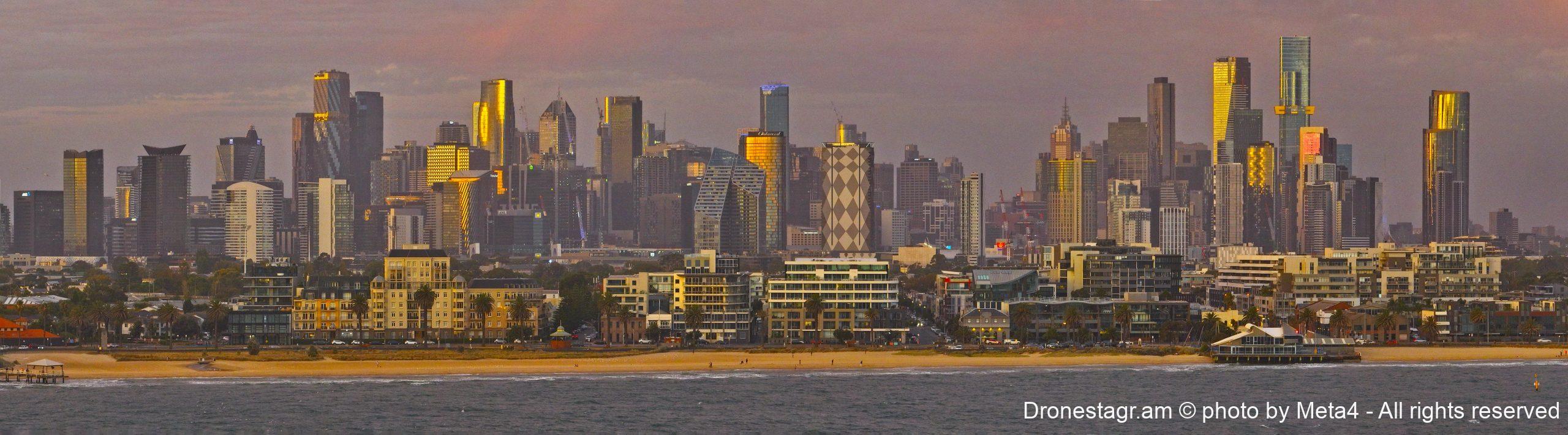 Late afternoon sun lights the high rise buildings at City Beach Drone Photography